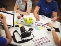 Graphic designers having discussion during meeting in office